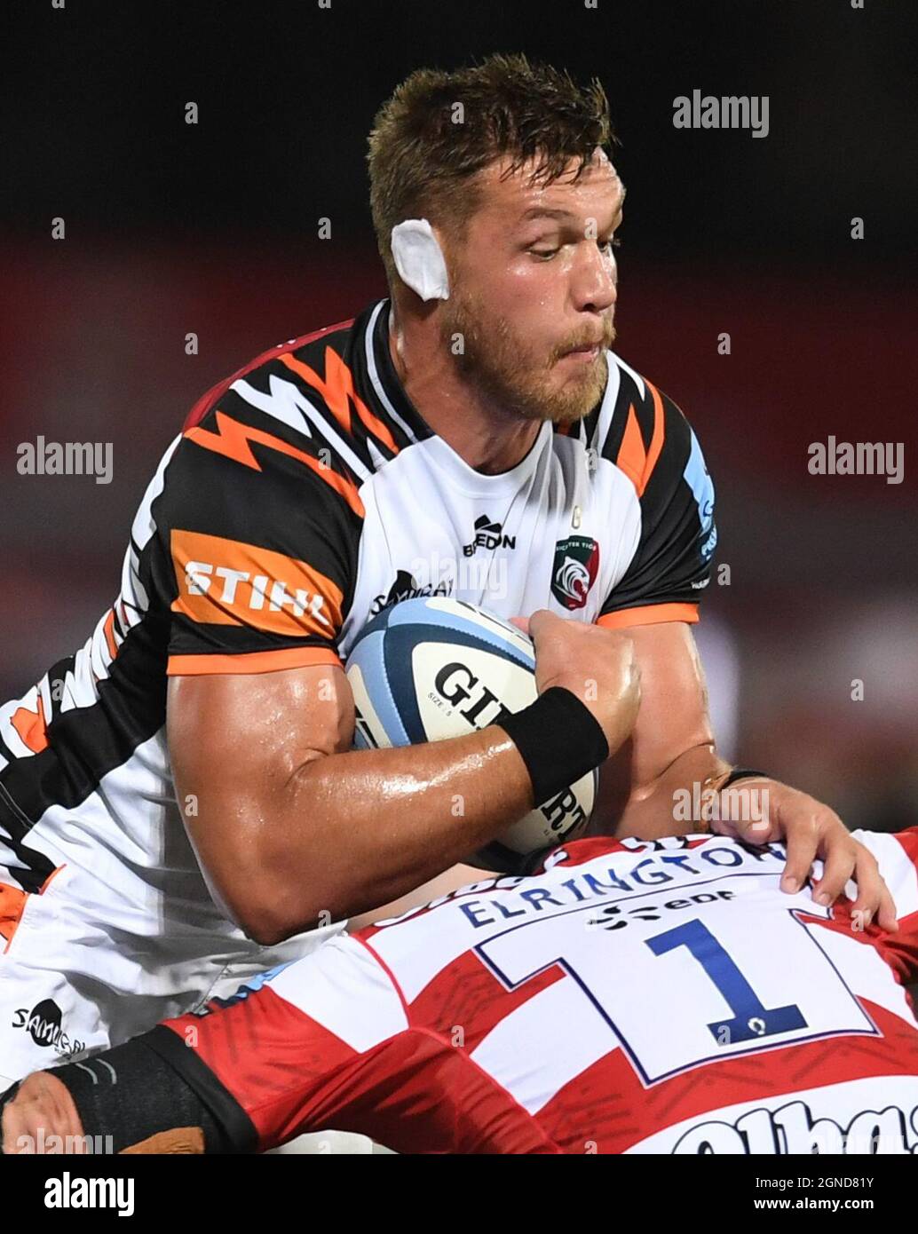 Kingsholm Stadium, Gloucester, UK. 24th Sep, 2021. Gallaher Premiership Rugby, Gloucester Rugby versus Leicester Tigers: Hanro Liebenberg of Leicester Tigers is tackled by Harry Elrington of Gloucester Credit: Action Plus Sports/Alamy Live News Stock Photo