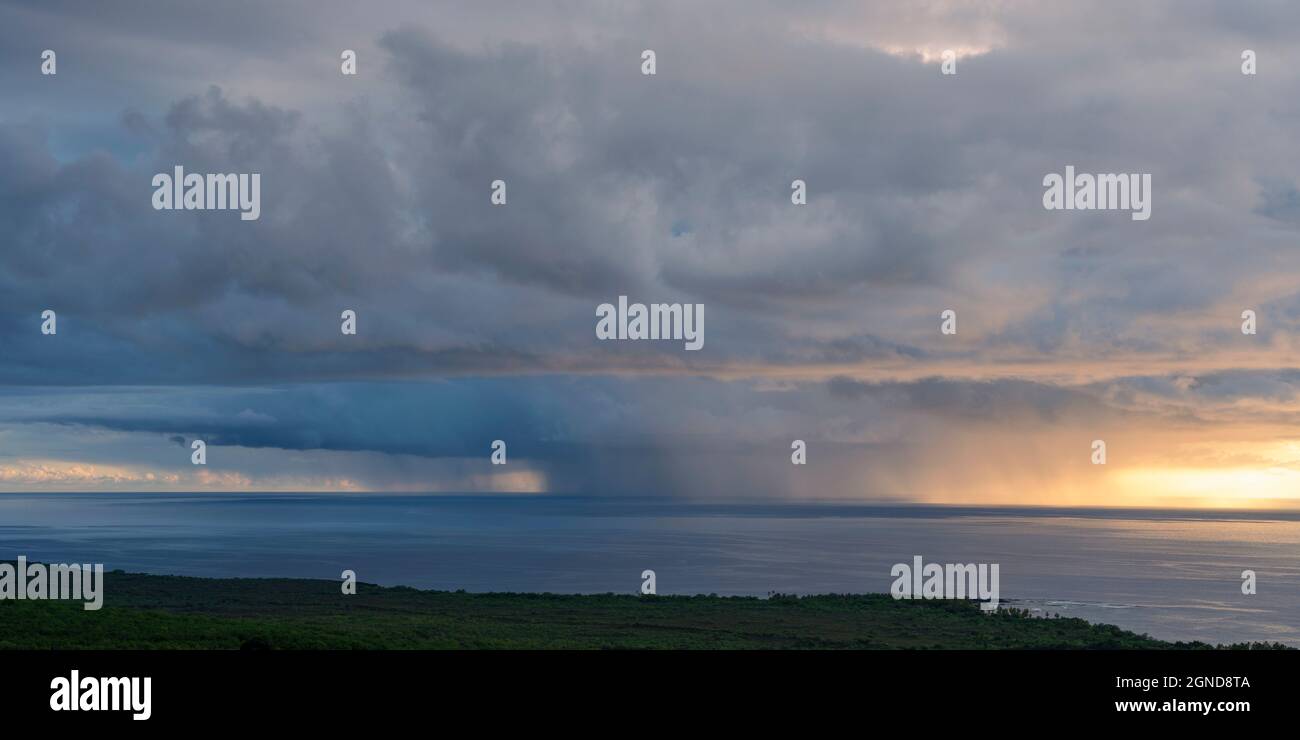 Rain cloud panorma at sunset over Kealakekua Bay, Kona Hawaii Stock Photo