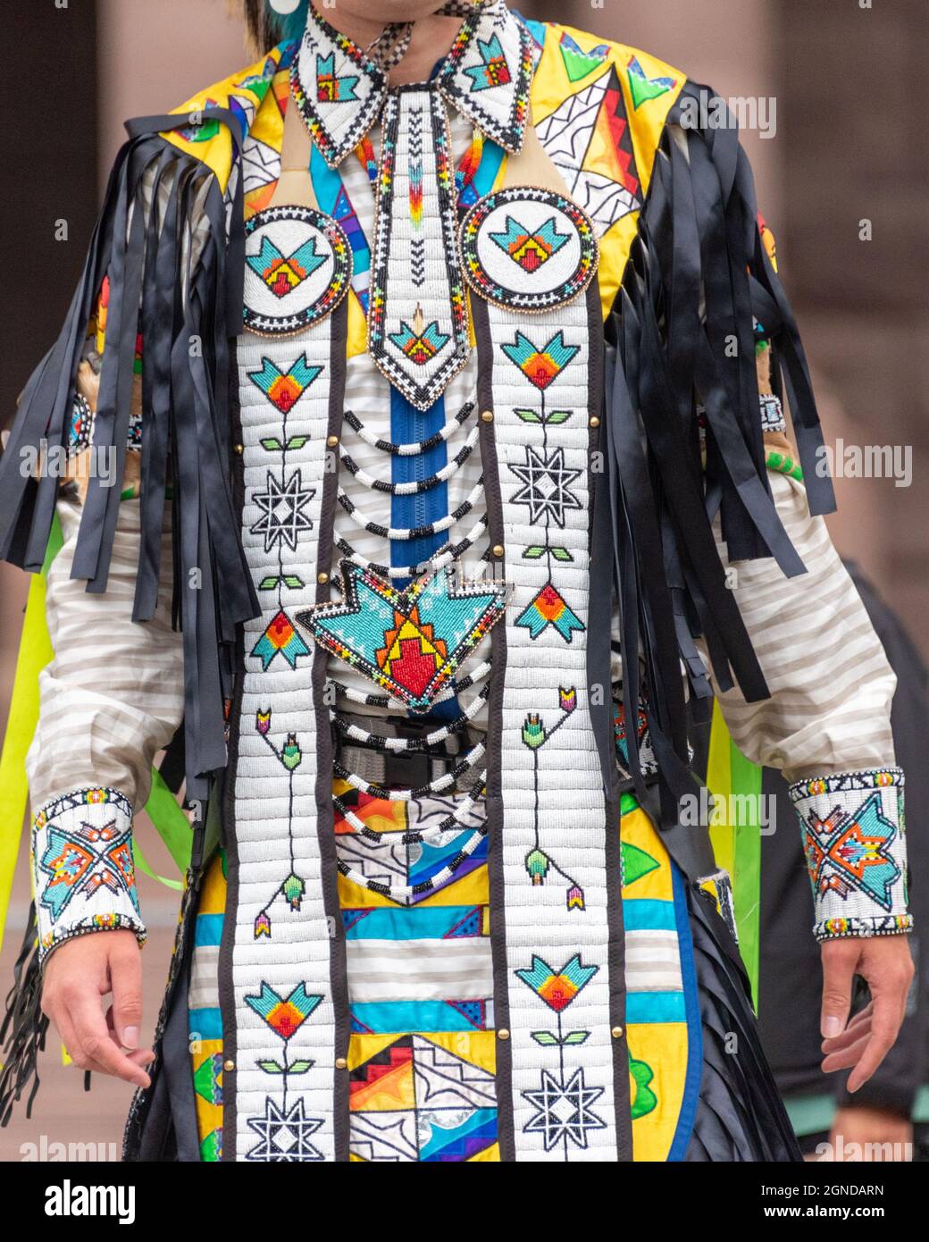 Traditional clothing of the First Nations of Canada (detail) during the Global Climate March organized by Fridays For Future in front of the Provincia Stock Photo