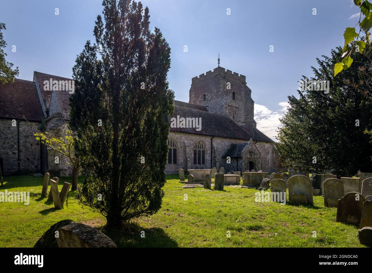 Saint Mary thre virgin church and graveyard in Westham on a summer afternoon Stock Photo