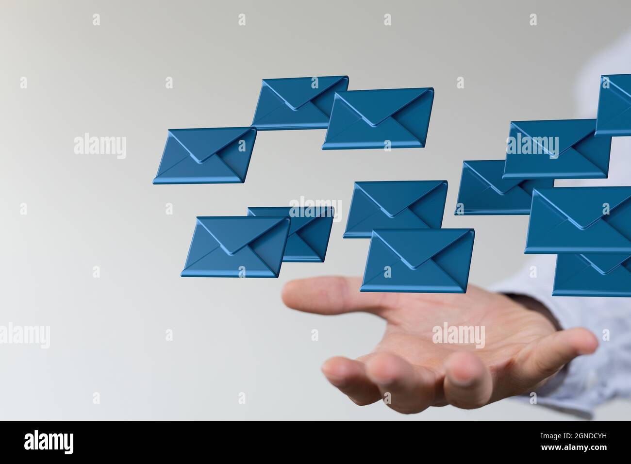 3d illustration of blue envelops hovering over a man's palm on white ...