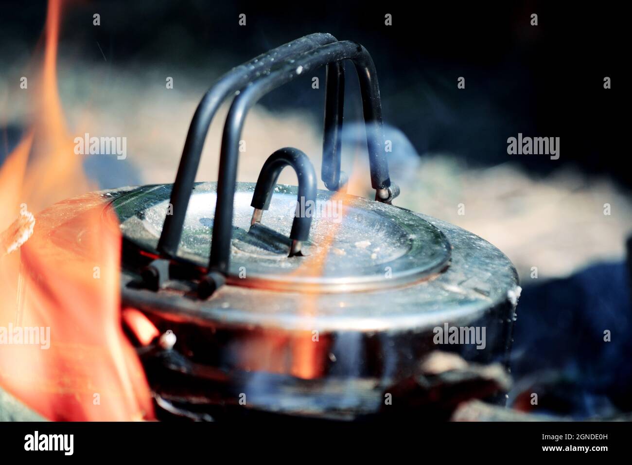 Kettle camp near the fire Stock Photo Alamy