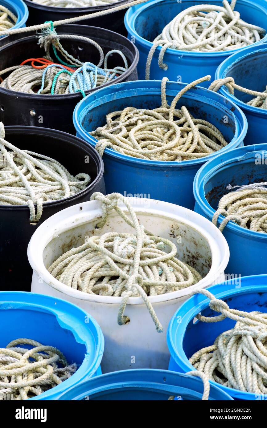 Ropes in buckets ready for setting lobster traps or lobster pots. Portland, Maine, USA Stock Photo