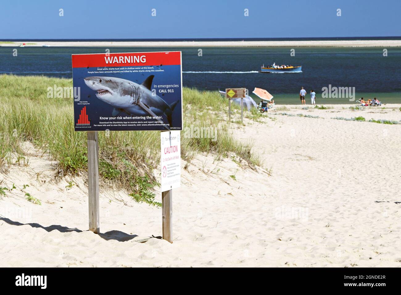 A Great White Shark warning sign on the beach in Chatham, Cape Cod