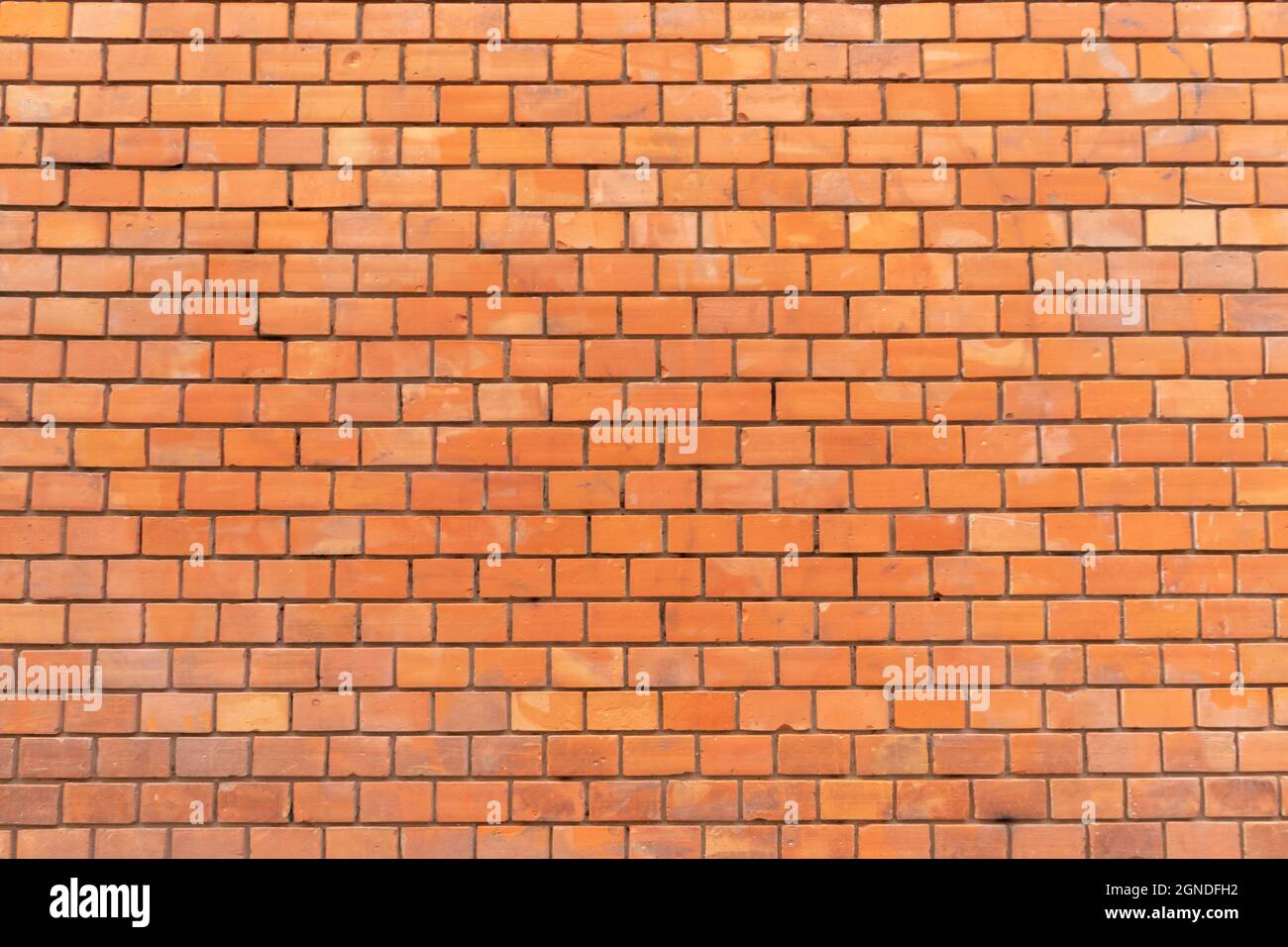 Red brick wall grunge background texture Stock Photo