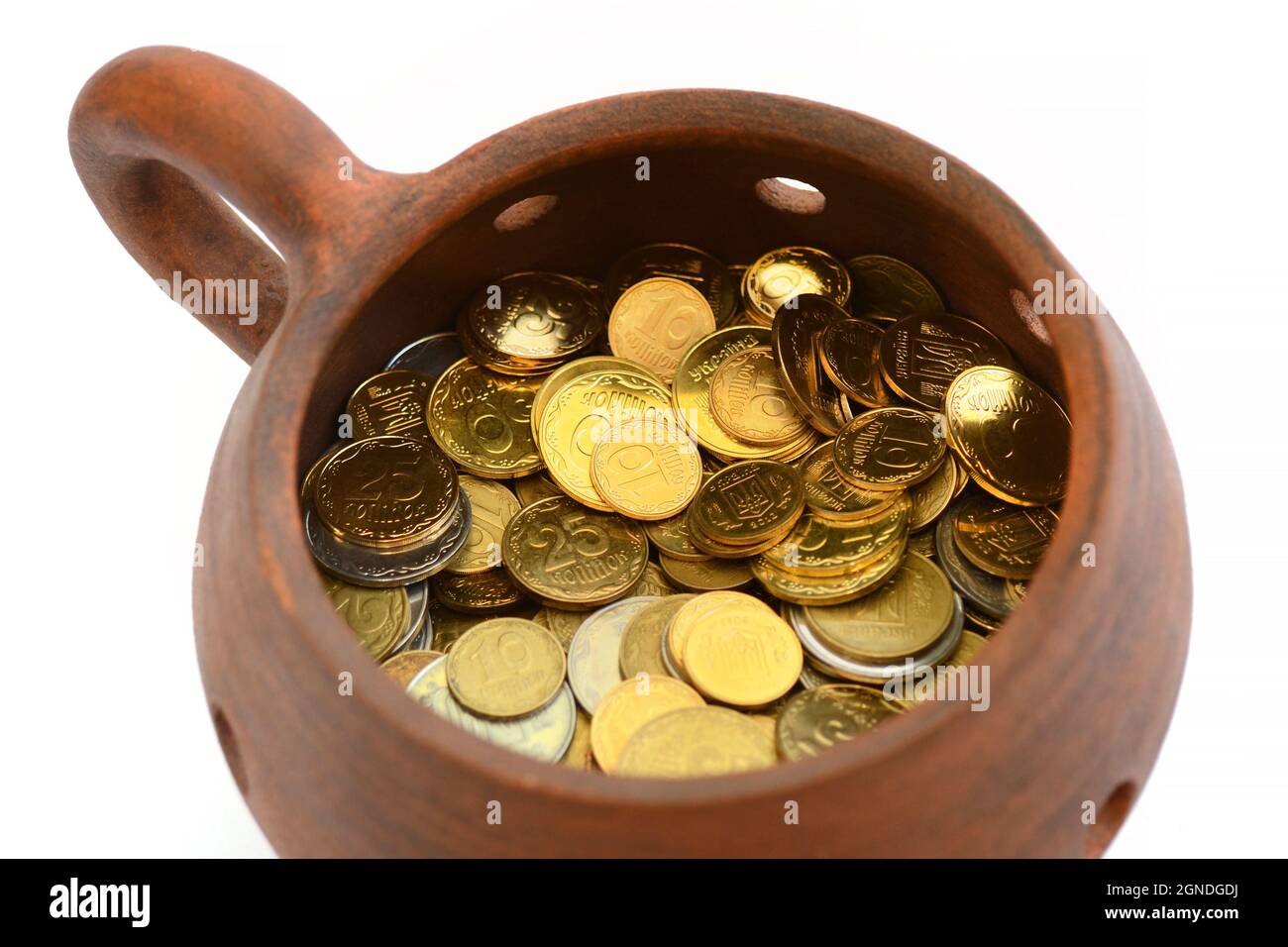 Clay crock, pot of money on a white background Stock Photo Alamy
