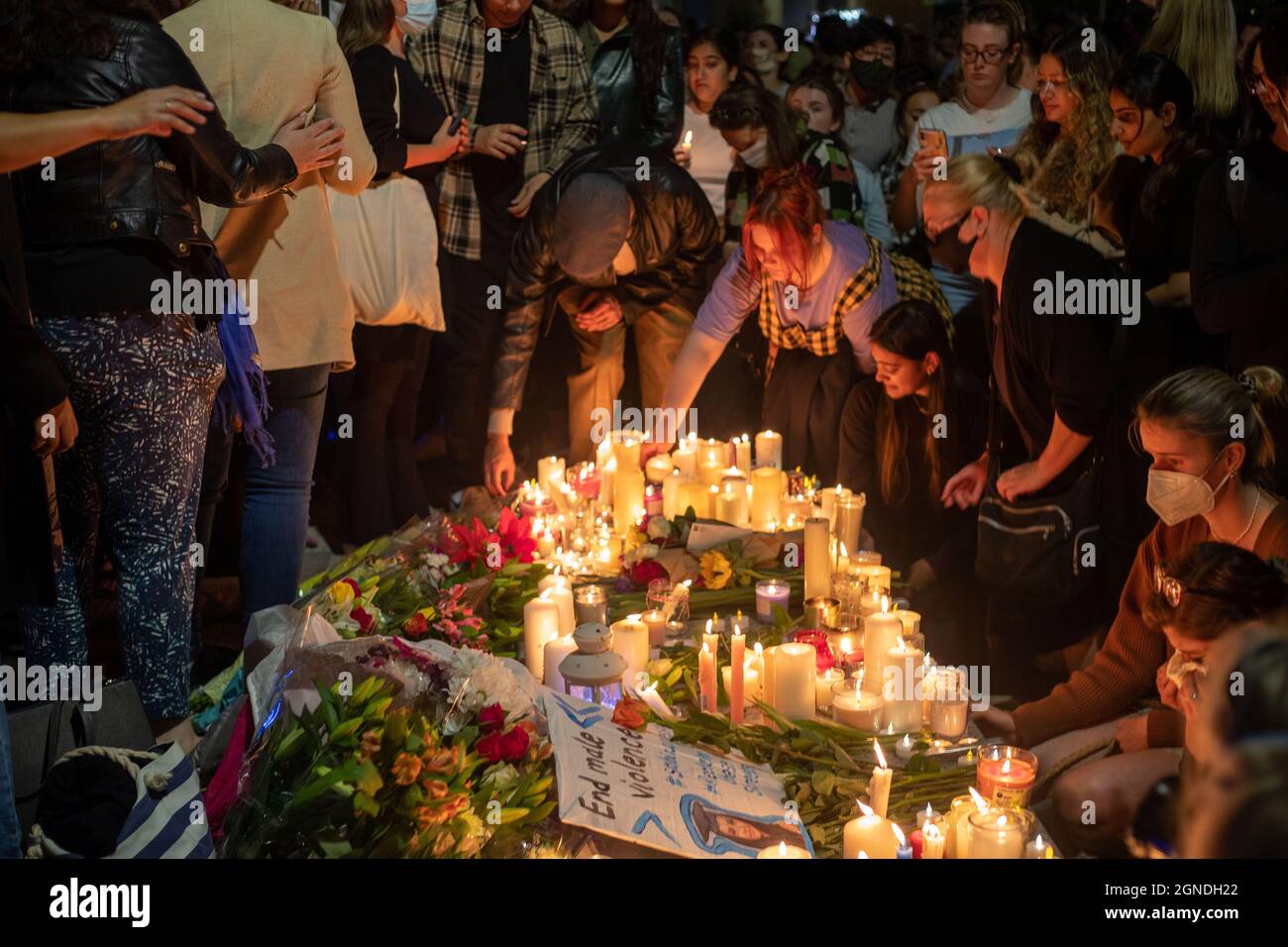 London, UK. September 24 2021 Flowers and tributes laid at candle lit vigil held on Pegler Square, Kidbrooke South-East London for murder victim Sabina Nessa Credit: Lucy North/Alamy Live News Stock Photo