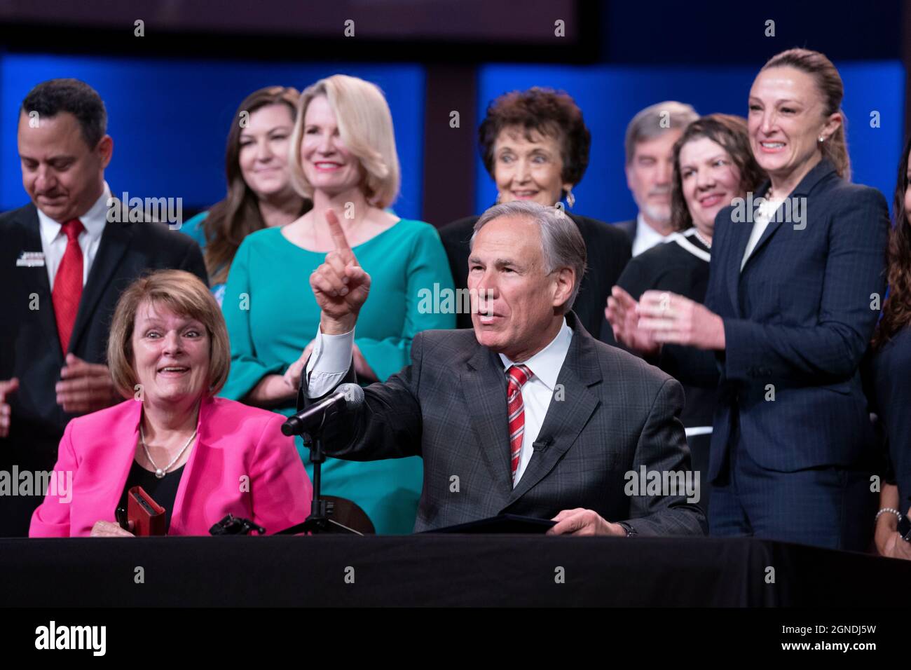 Austin, Texas, USA. 24th Sep, 2021. Calling it 'the icing on the cake', Texas Gov. GREG ABBOTT poses for pictures after signing a bill further restricting abortions in Texas. The bill outlaws mail-order abortion drugs in Texas. Abbott spoke at the Texas Faith, Family & Freedom Forum at an Austin church. Credit: Bob Daemmrich/Alamy Live News Credit: Bob Daemmrich/Alamy Live News Stock Photo