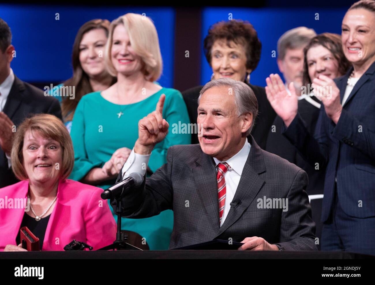 Austin, Texas, USA. 24th Sep, 2021. Calling it 'the icing on the cake', Texas Gov. GREG ABBOTT poses for pictures after signing a bill further restricting abortions in Texas. The bill outlaws mail-order abortion drugs in Texas. Abbott spoke at the Texas Faith, Family & Freedom Forum at an Austin church. Credit: Bob Daemmrich/Alamy Live News Credit: Bob Daemmrich/Alamy Live News Stock Photo