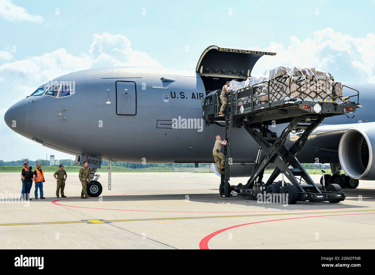 A KC-46A Pegasus being loaded at Selfridge Air National Guard Base, Michigan, on July 29, 2021 by 127th Logistics Readiness Squadron. The KC-46A is the first phase in recapitalizing the U.S. Air Force's aging tanker fleet. With greater refueling, cargo, and aeromedical evacuation capabilities the Pegasus provides next generation aerial refueling support to Air Force, Navy, Marine Corps and partner-nation receivers. (U.S. Air National Guard photo by Munnaf H. Joarder) Stock Photo