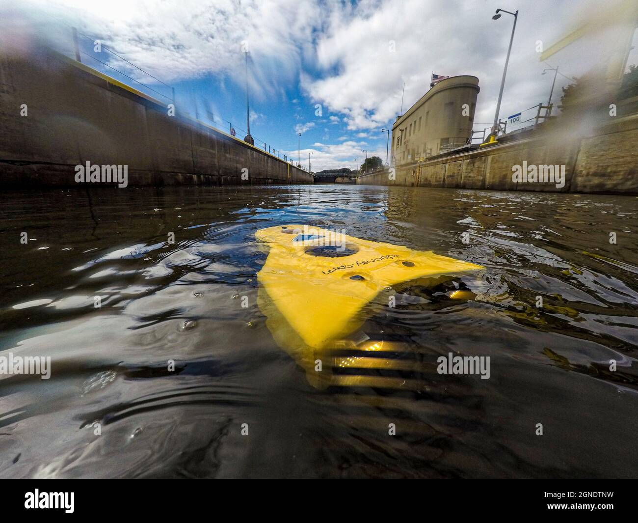 Members of the U.S. Army Corps of Engineers Pittsburgh District train on the VideoRay PRO 5, an underwater remote operated vehicle (ROV), at a lock and dam facility on the Allegheny River in Natrona, Pennsylvania, Sept. 22, 2021. This ROV model is new to the Pittsburgh District, equipped with a high-definition video and photo camera, a multibeam sonar, a claw that can rotate and grab objects, and a motor that is twice as powerful as the previous version to pilot through stronger currents. (U.S. Army Corps of Engineers photo by Chris Smith) Stock Photo