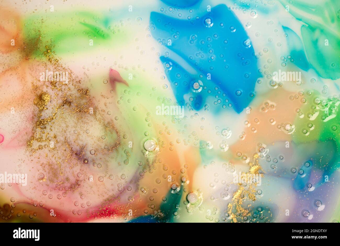 Bubbling Ink Texture Close up colorful ink stains background. Liquid transparent bubbles ...
