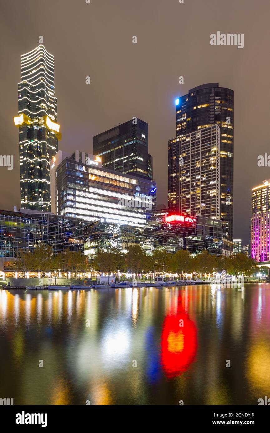 Highrise attractions in Southbank in Melbourne, Australia, seen from the Yarra River by night. Stock Photo