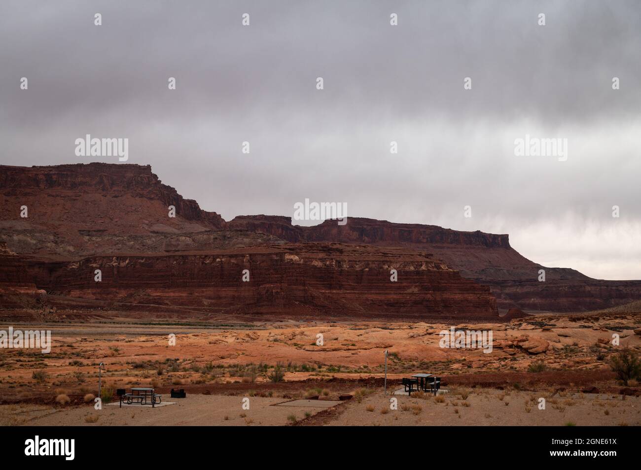 Picnic tables at Hite Marina Campground in Utah, USA during moody