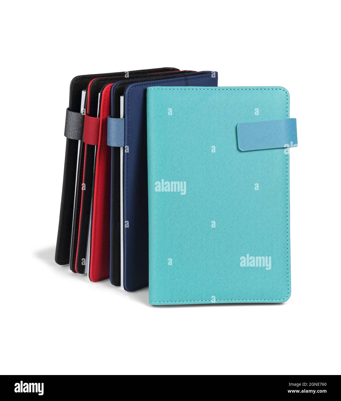 Row of Colorful Diaries Standing on White Background Stock Photo