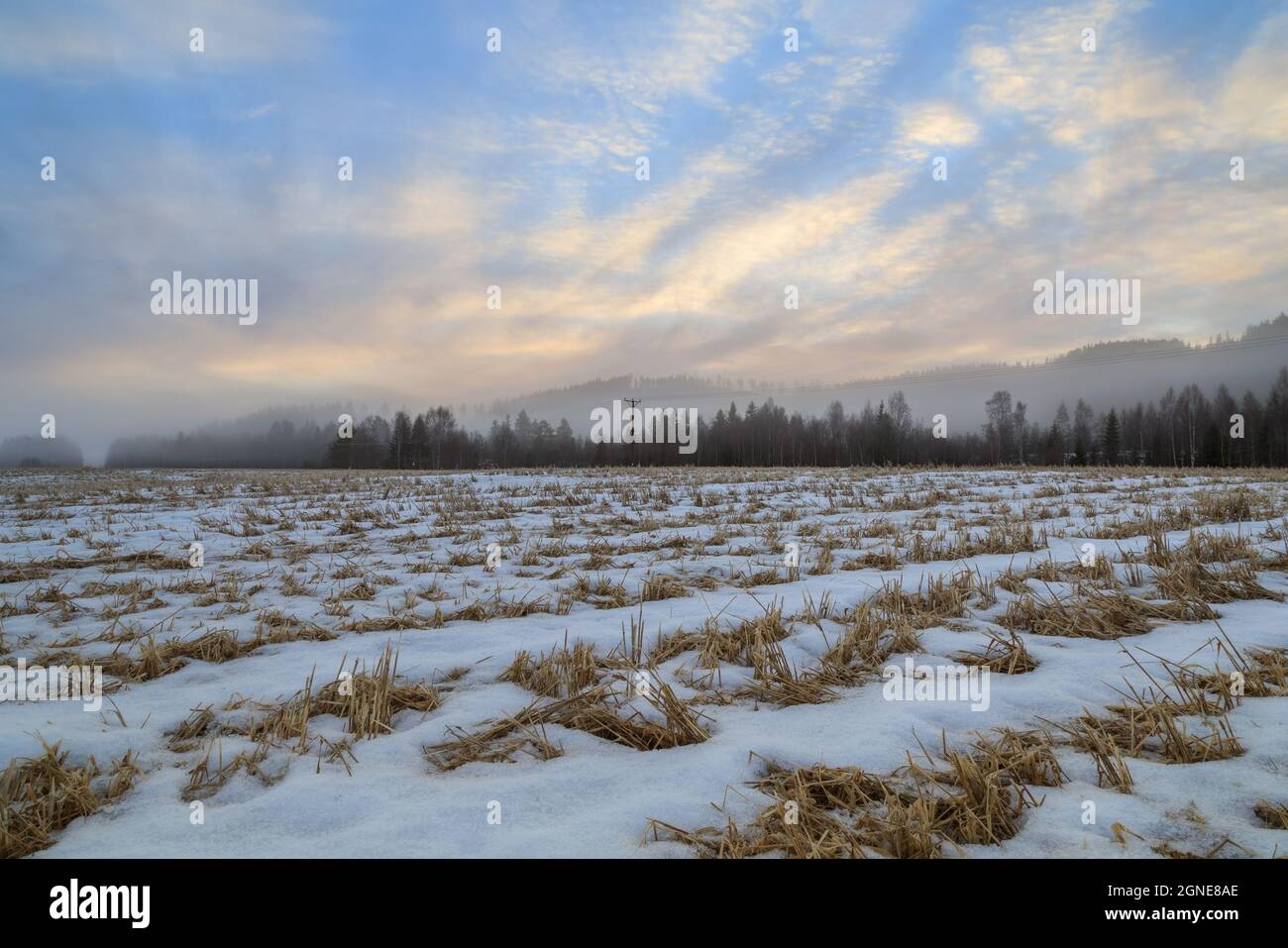 fields with snow in a winter, mountain landscape during sunrise Stock Photo