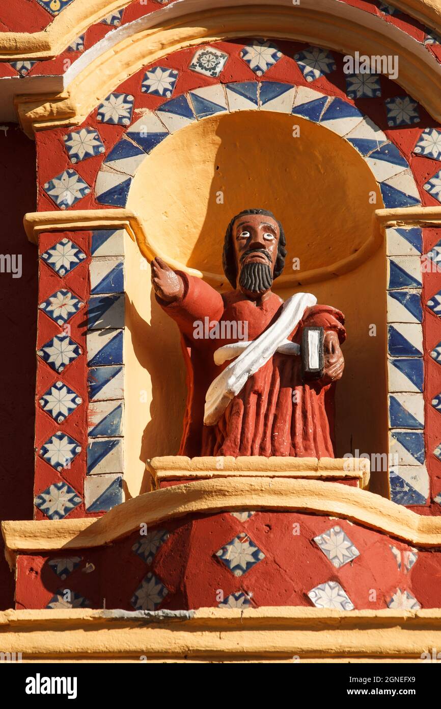 Colorful sculpture of a saint in Santa Maria Tonantzintla church in Cholula, Puebla, Mexico Stock Photo