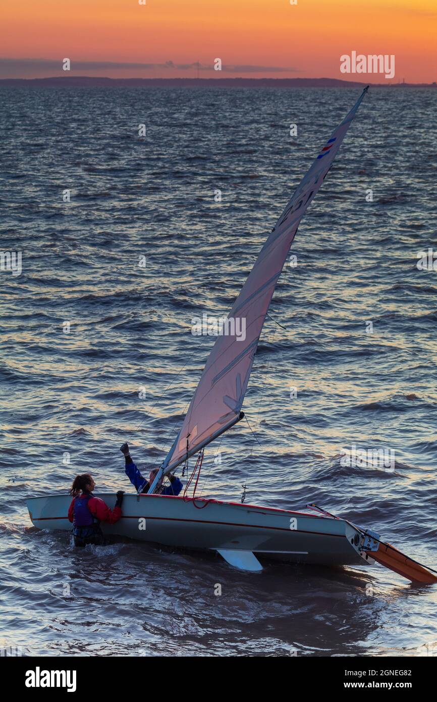 Sailing dinghies on a breezy evening Stock Photo Alamy