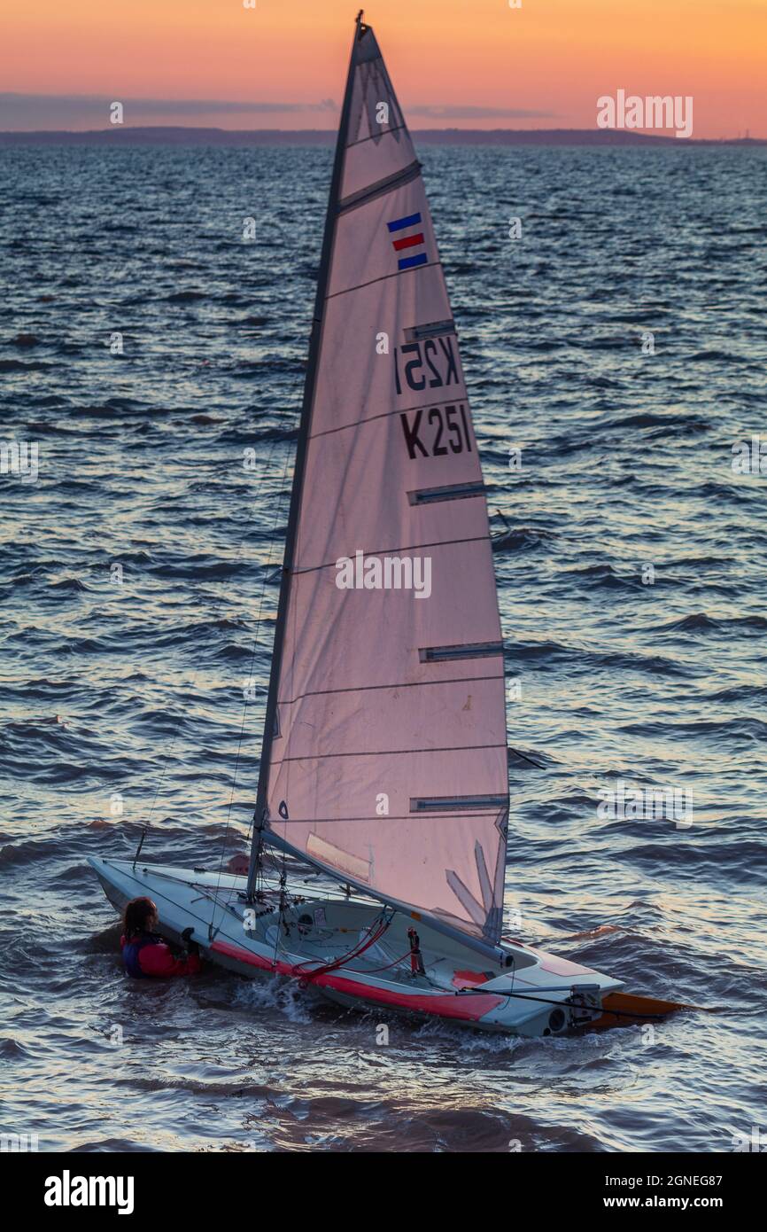 Sailing dinghies on a breezy evening Stock Photo Alamy