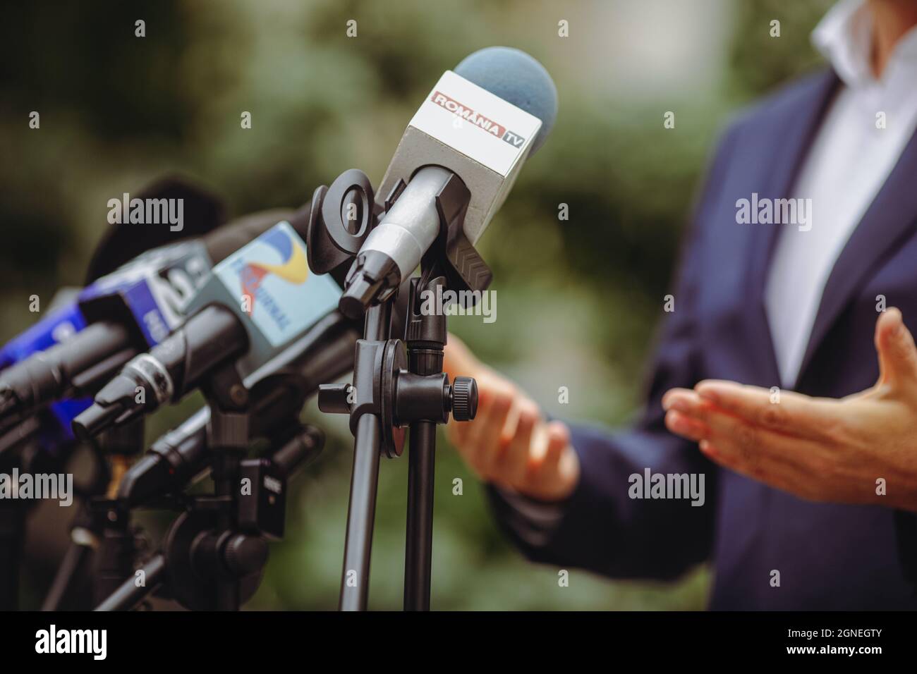 Bucharest, Romania - September 23, 2021: Shallow depth of field (selective focus) image with  microphones from various Romanian news televisions durin Stock Photo