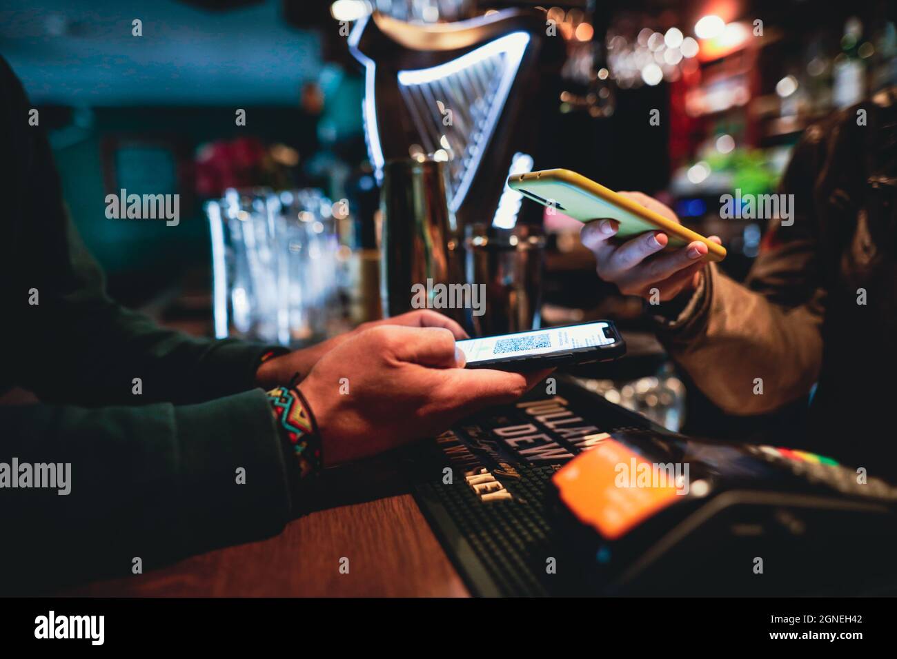 Bucharest, Romania - September 23, 2021: Shallow depth of field (selective focus) image with a restaurant client showing a Covid-19 certificate from a Stock Photo