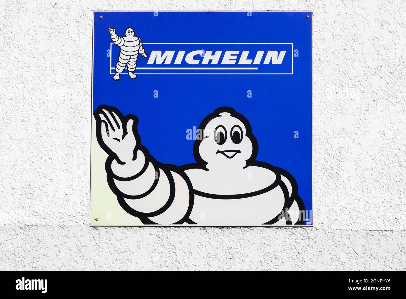 Jassans, France - March 28, 2020: Michelin logo on a wall. Michelin is a tire manufacturer based in Clermont-Ferrand in France Stock Photo
