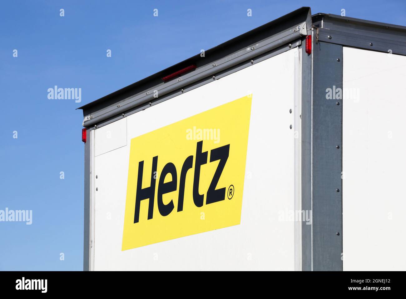 Villefranche sur Saone, France - March 8, 2020: Hertz logo on a truck. Hertz is an American car rental company with international locations Stock Photo