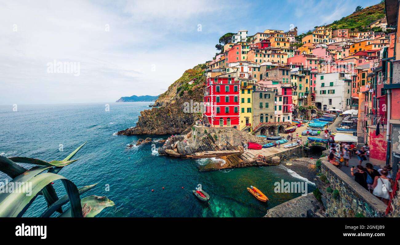 First city of the Cique Terre sequence of hill cities - Riomaggiore. Colorful morning view of Liguria, Italy, Europe. Great spring seascape of Mediter Stock Photo
