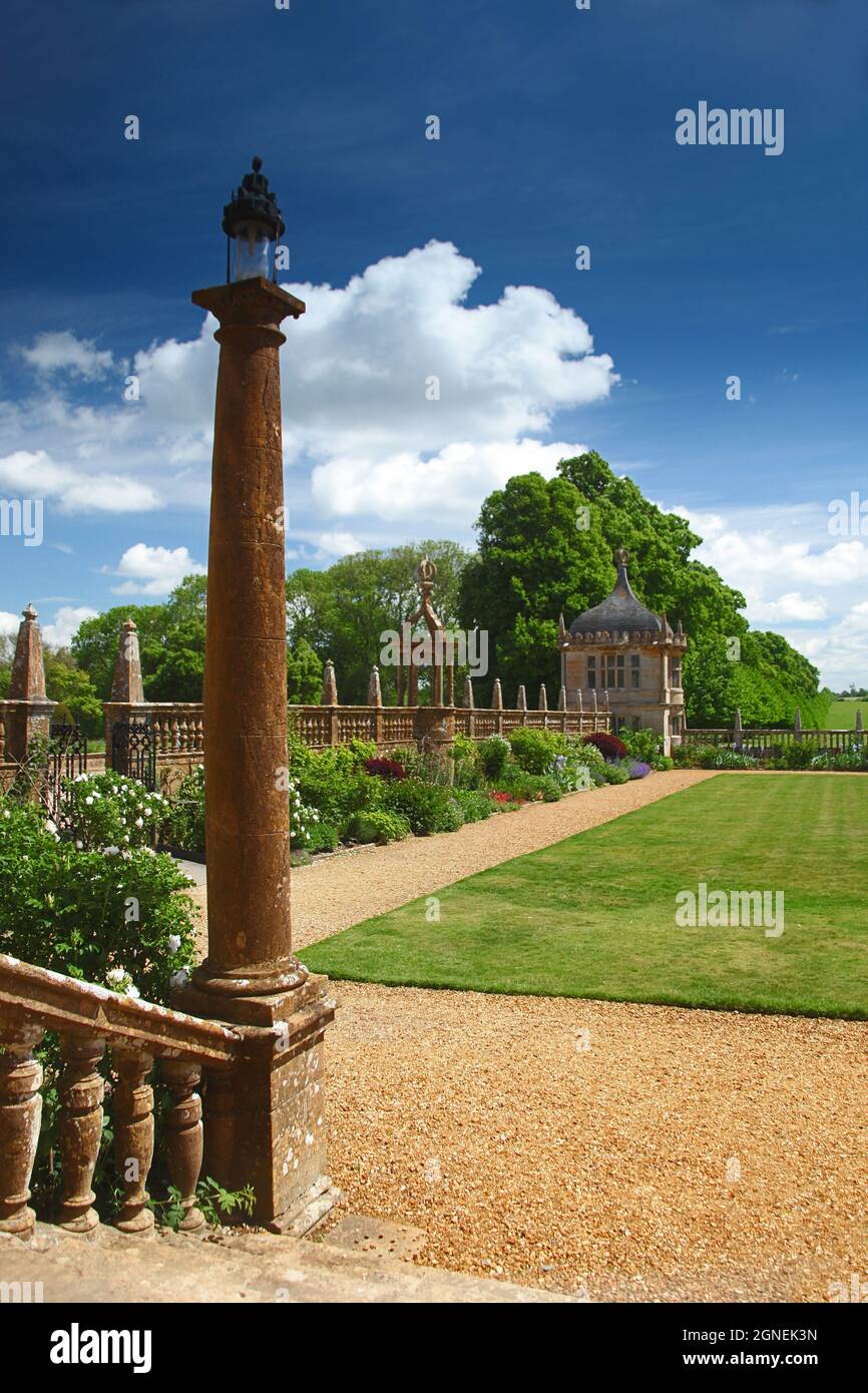 A Doric column outside the east front of Montacute House, an Elizabethan mansion with garden near Yeovil, Somerset, England, UK Stock Photo