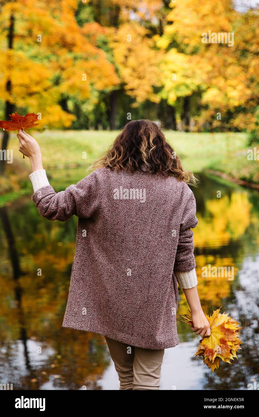 Fall woman park hi-res stock photography and images - Alamy