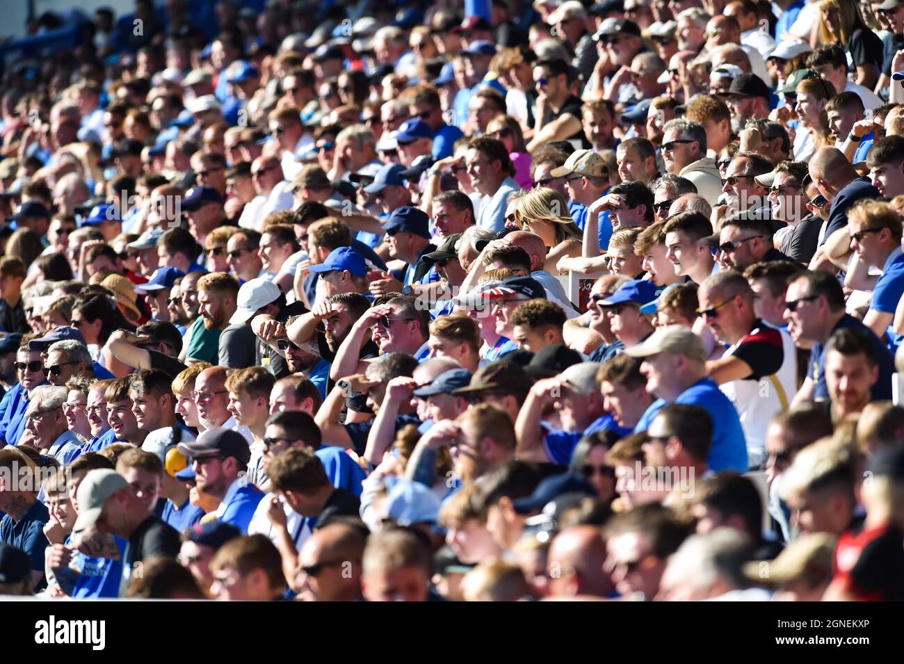 Portsmouth fans in the sunshine during the Sky Bet League One match between Portsmouth and Cambridge United at Fratton Park  , Portsmouth ,  UK - 18 September 2021 Editorial use only. No merchandising. For Football images FA and Premier League restrictions apply inc. no internet/mobile usage without FAPL license - for details contact Football Dataco Stock Photo