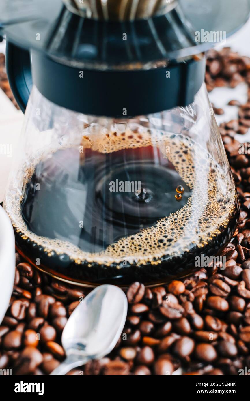 Fresh brewed coffee in a cup using Alternative method, with pour over