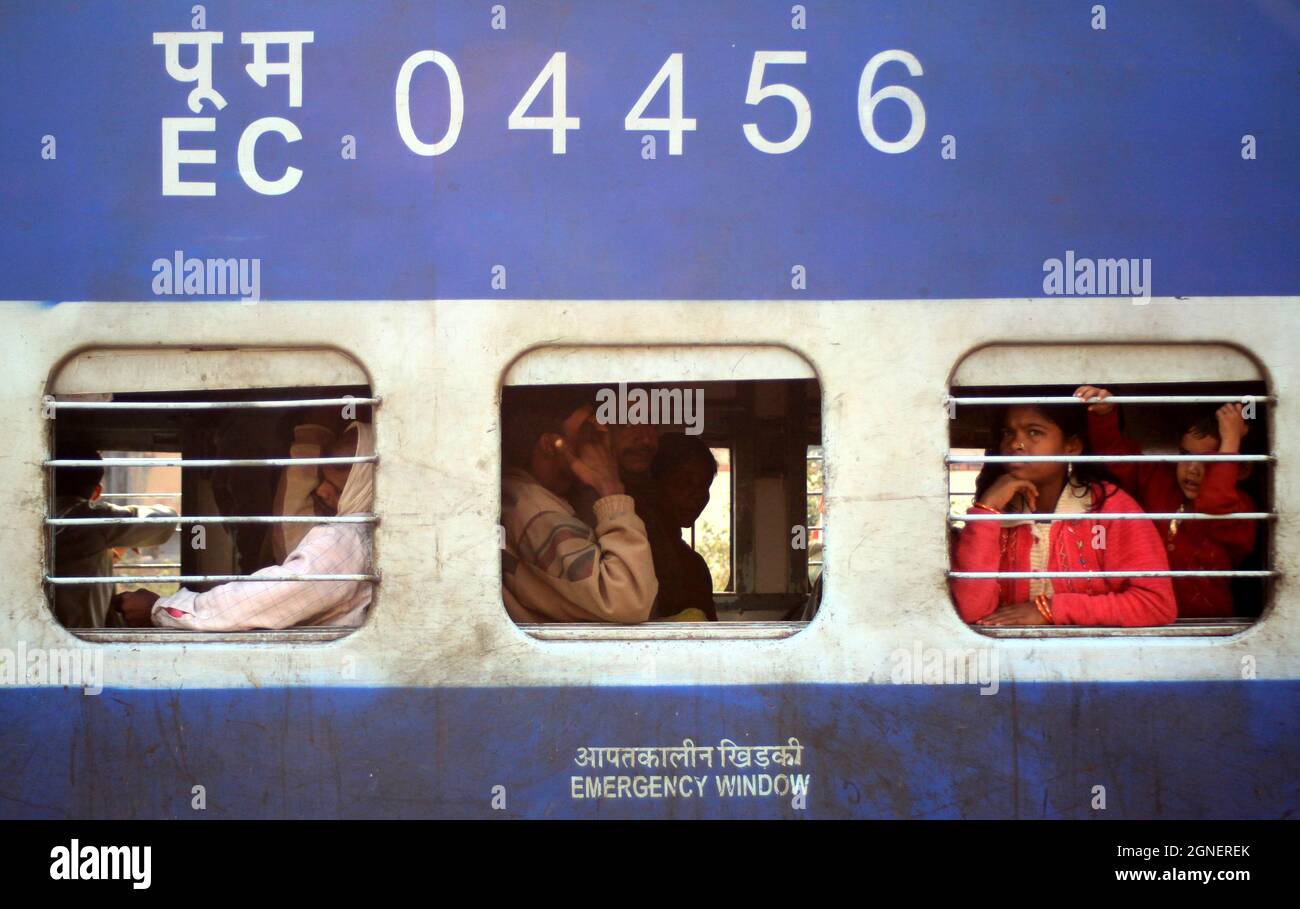 Indian Passengrs sit in a Indian Railways ICF made general coach. Now