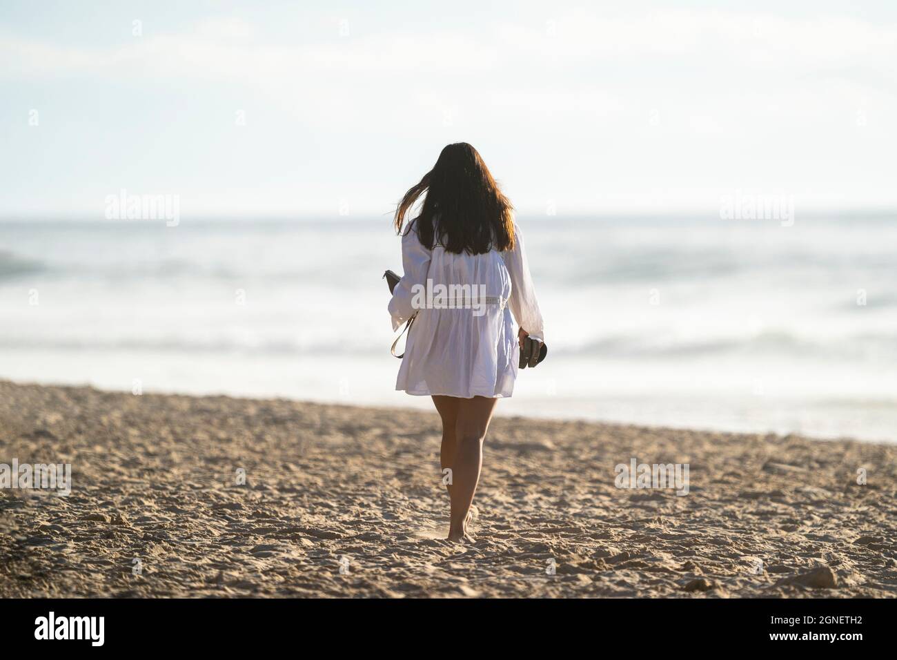 Woman alone walk beach hi-res stock photography and images - Alamy