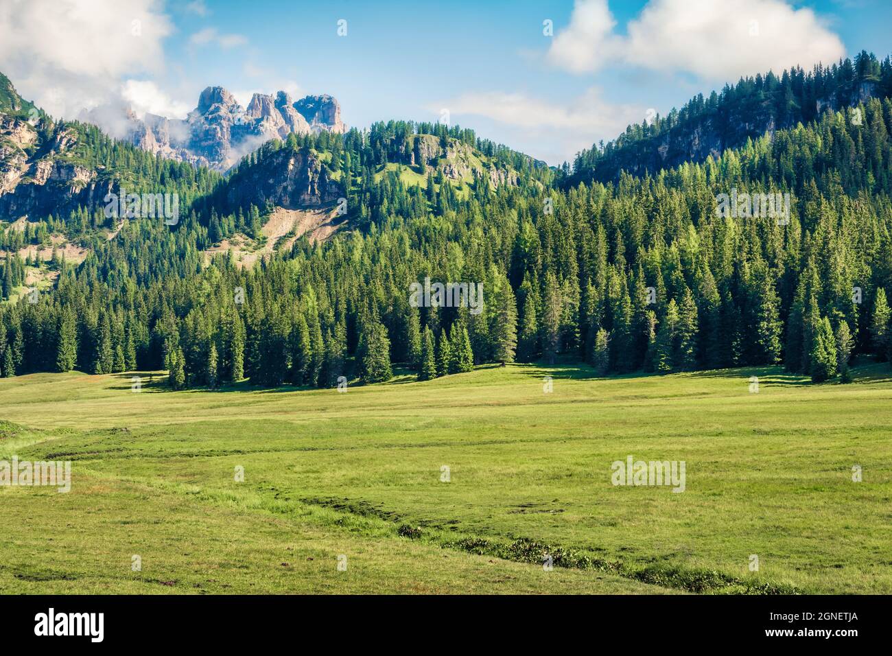 Sunny summer view of the mountain valley with Piana peak. Beautiful morning scene of Dolomite Alps, Tre Cime Dui Lavaredo national park, Italy, Europe Stock Photo