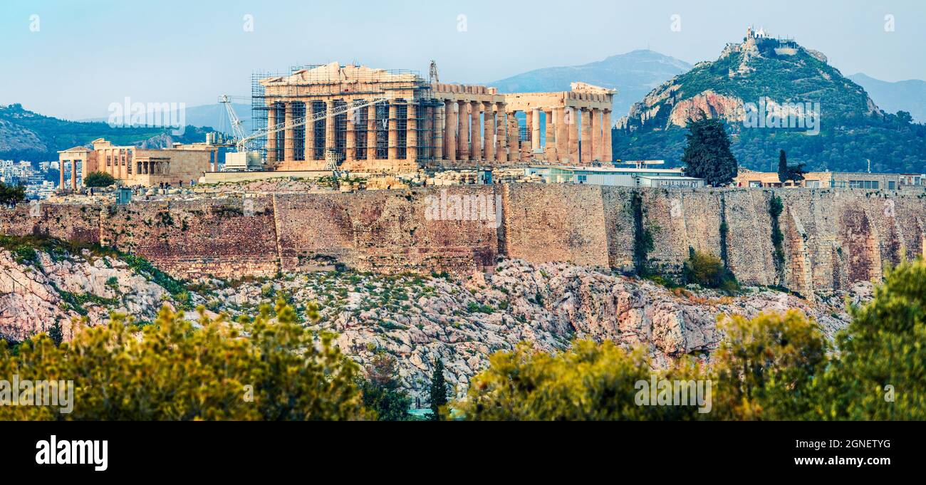 Amazin spring panorama of Parthenon, former temple, on the Athenian Acropolis, Greece, Europe. Colorful morning scene in Athens. Treveling concept bac Stock Photo