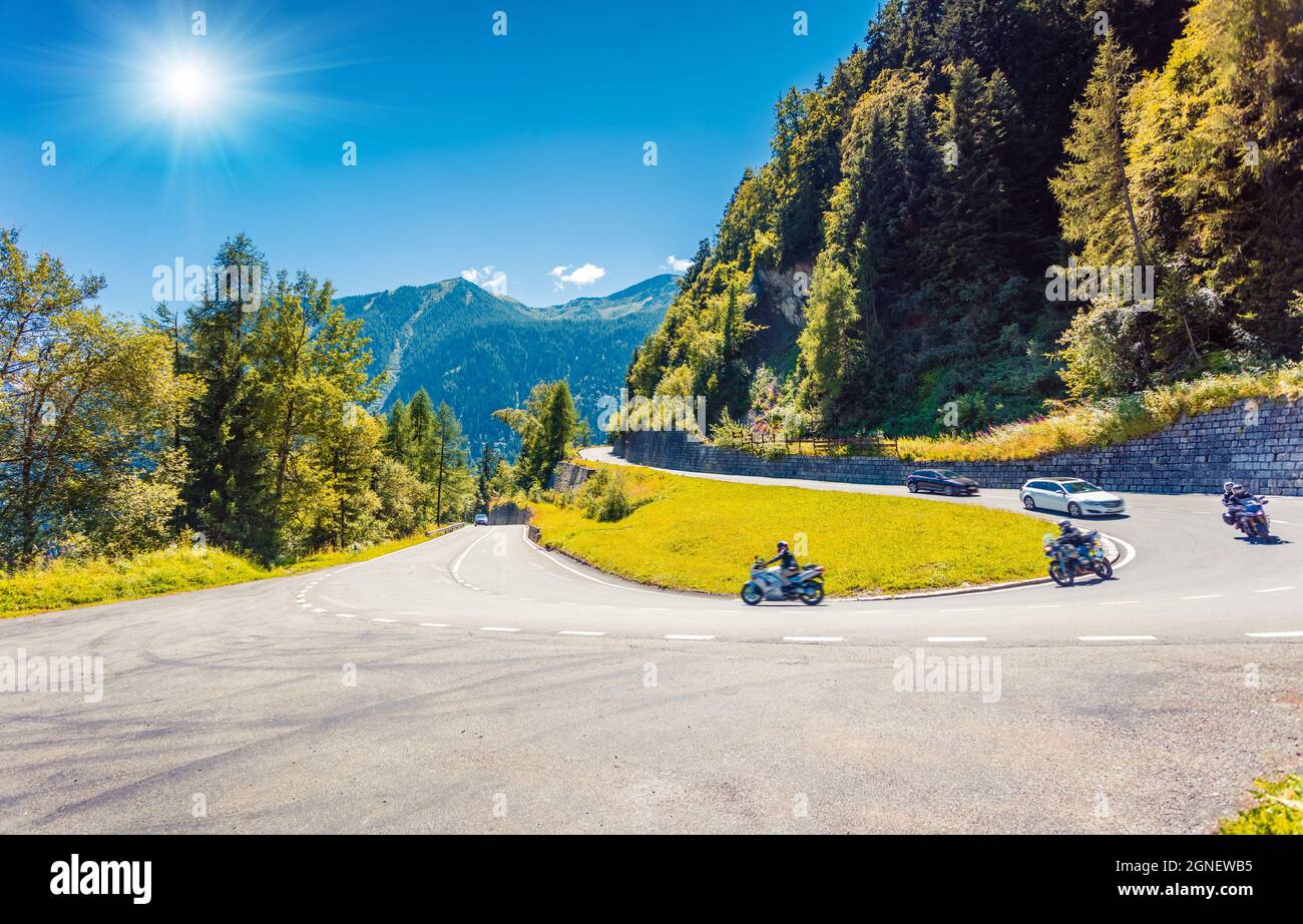 Mountain pass between France and Switzerland. Sunny summer view of Route de la Forclaz roud. Great morning scene of Swiss Alps, Switzerland, Europe. T Stock Photo