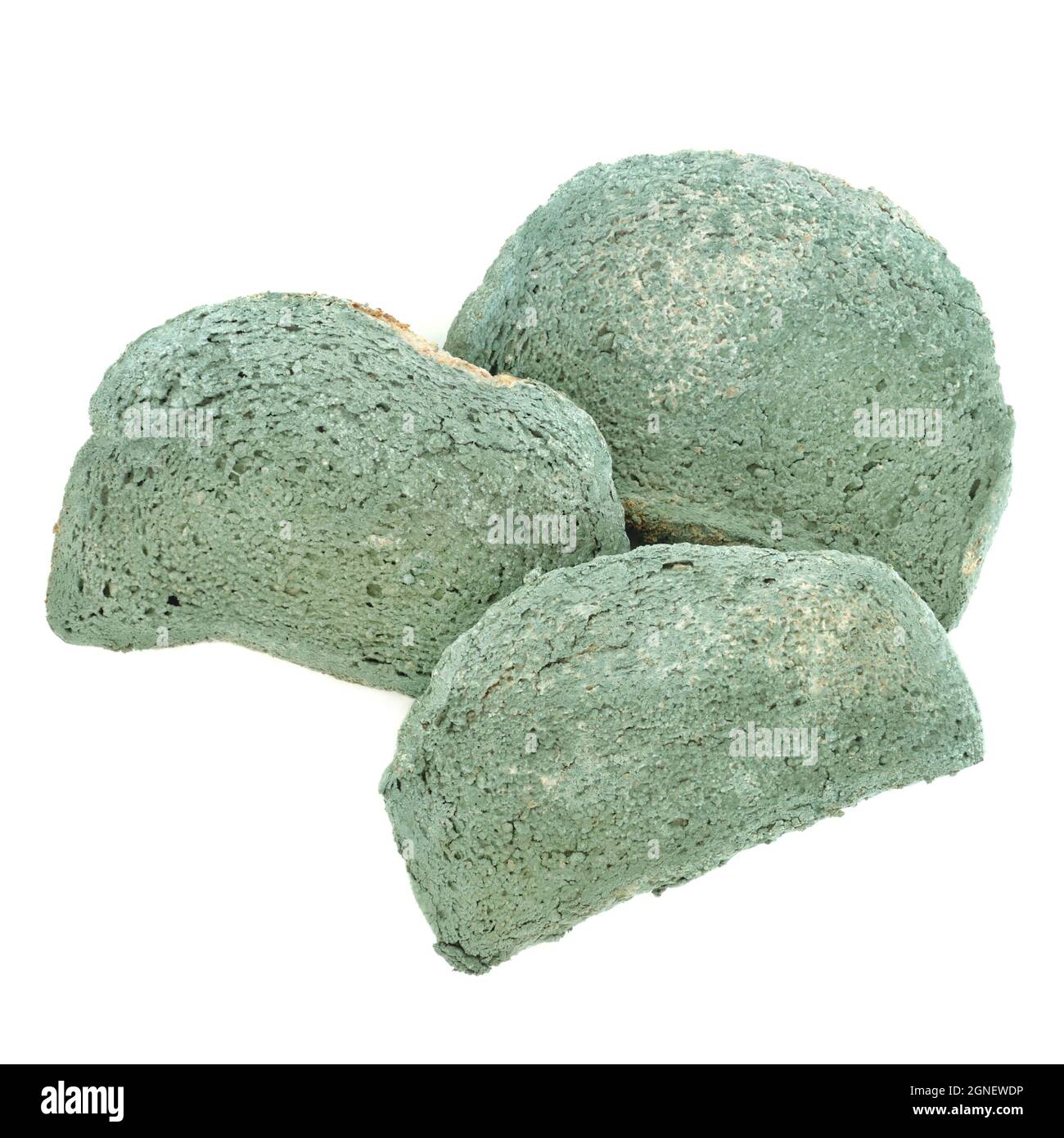Disgusting green moldy bread slices on white background. Out of expiry date usage concept. Stock Photo