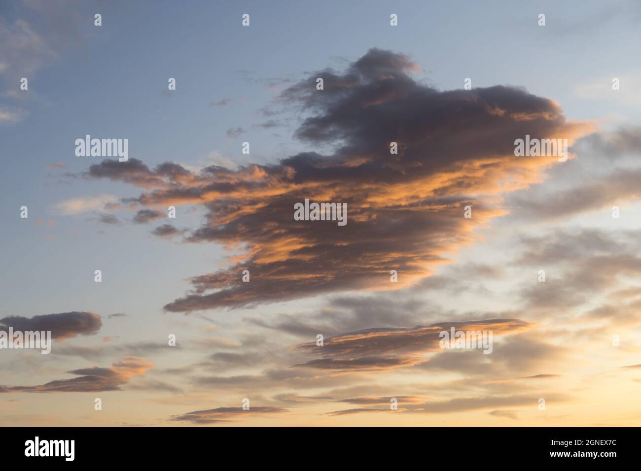 scenic orange and gray clouds at sunset abstract sky background Stock ...