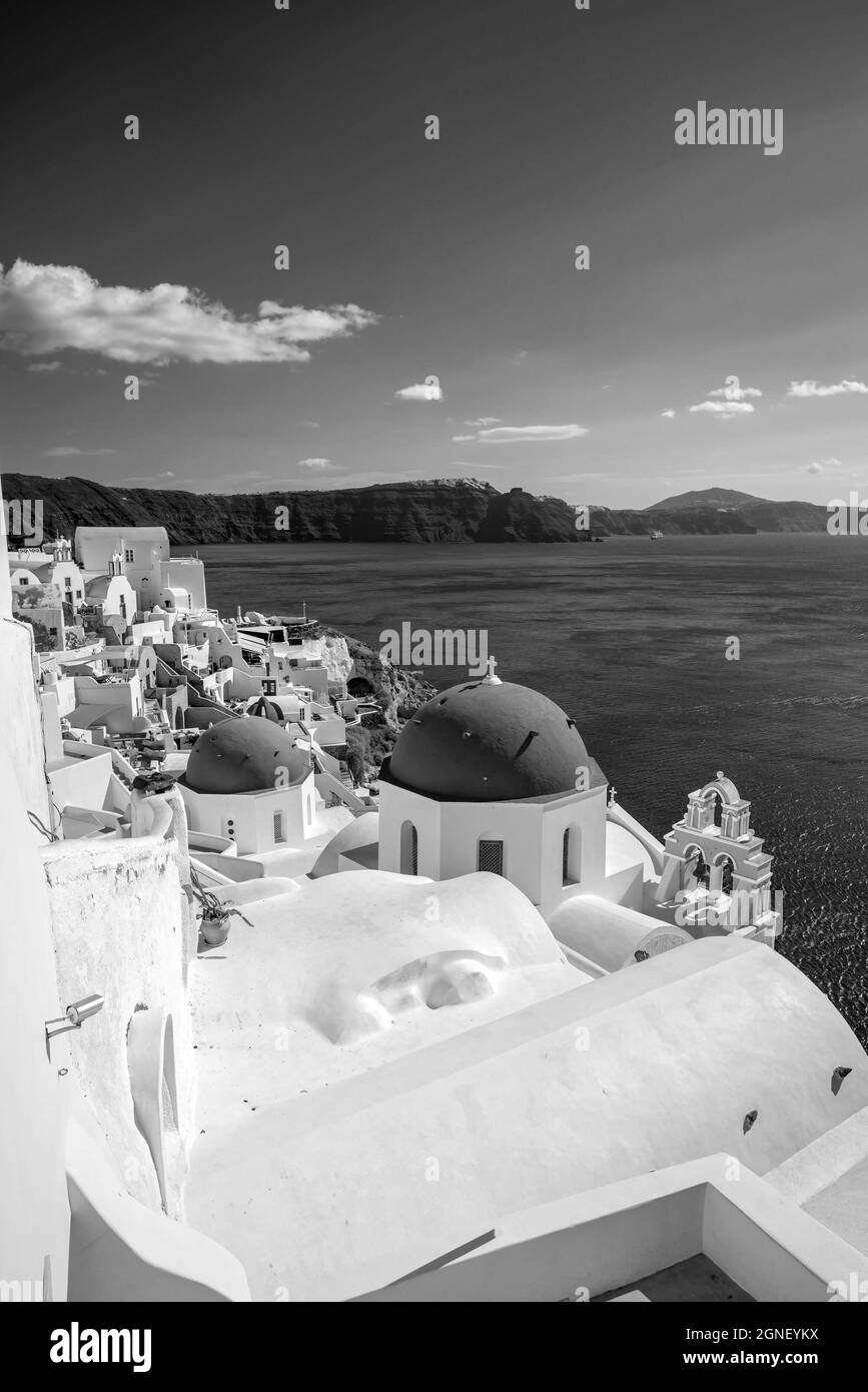 Oia town cityscape at Santorini island in Greece. Aegean sea in black and white Stock Photo
