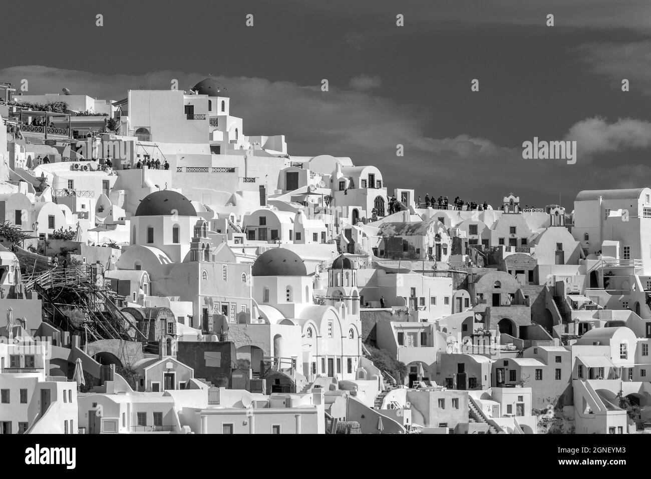 Oia town cityscape at Santorini island in Greece. Aegean sea in black and white Stock Photo