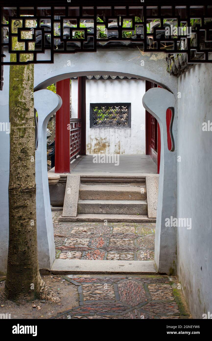 Doorway with interesting shape in ancient Yu Yuan Garden in Shanghai, China Stock Photo