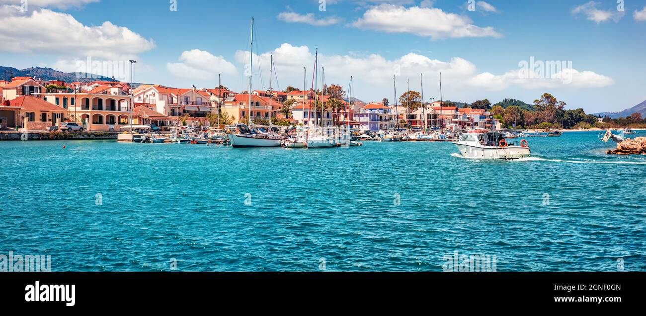 Panoramic morning view of Lixouri port. Splendid spring seascape of Ionian Sea. Sunny outdoor scene of Kefalonia island. Traveling concept background. Stock Photo