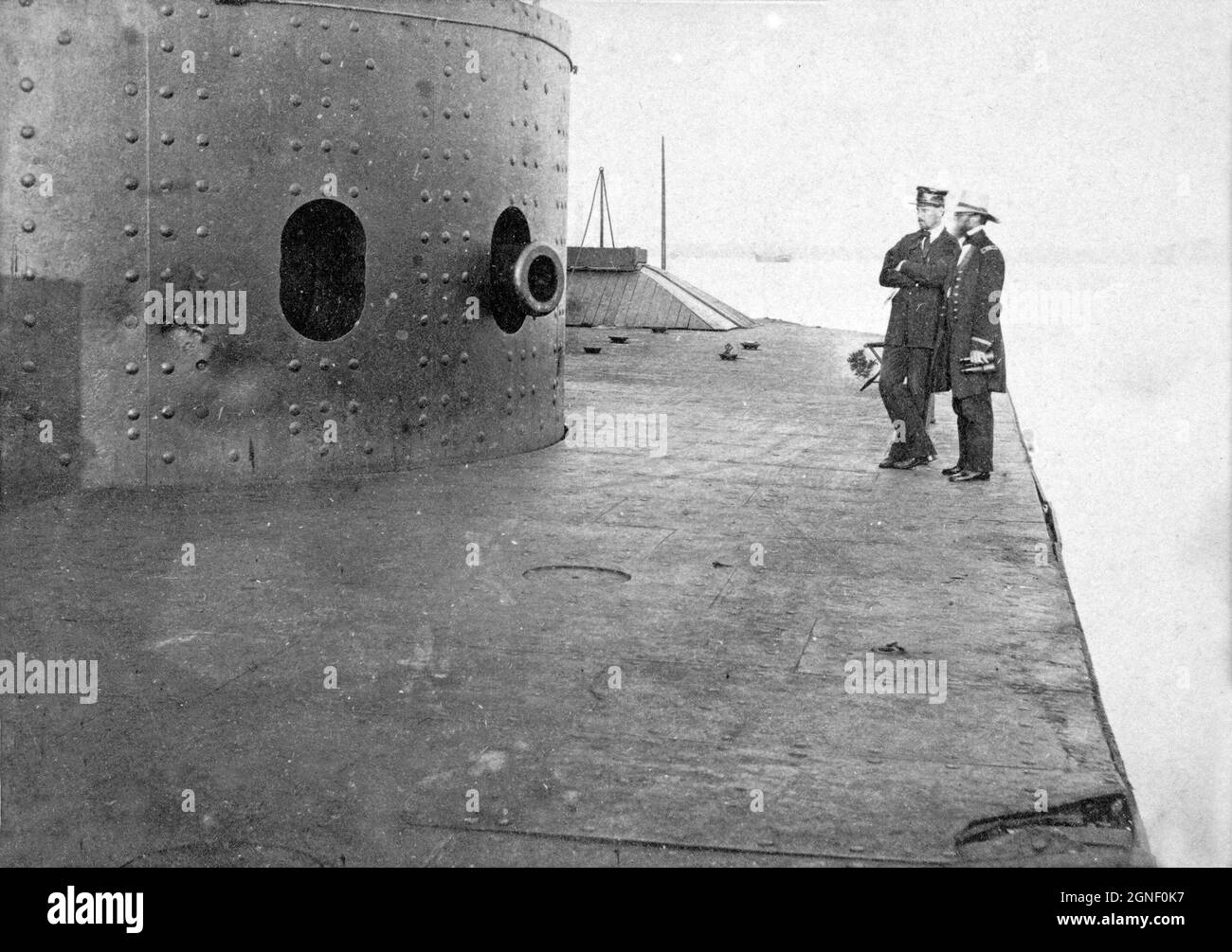 Vintage photograph circa 1862 Union navy iron clad USS Monitor on the James River, Virginia during the American Civil War showing the deck and gun turret and the muzzle of one of the Dahlgren guns she was equipped with Stock Photo