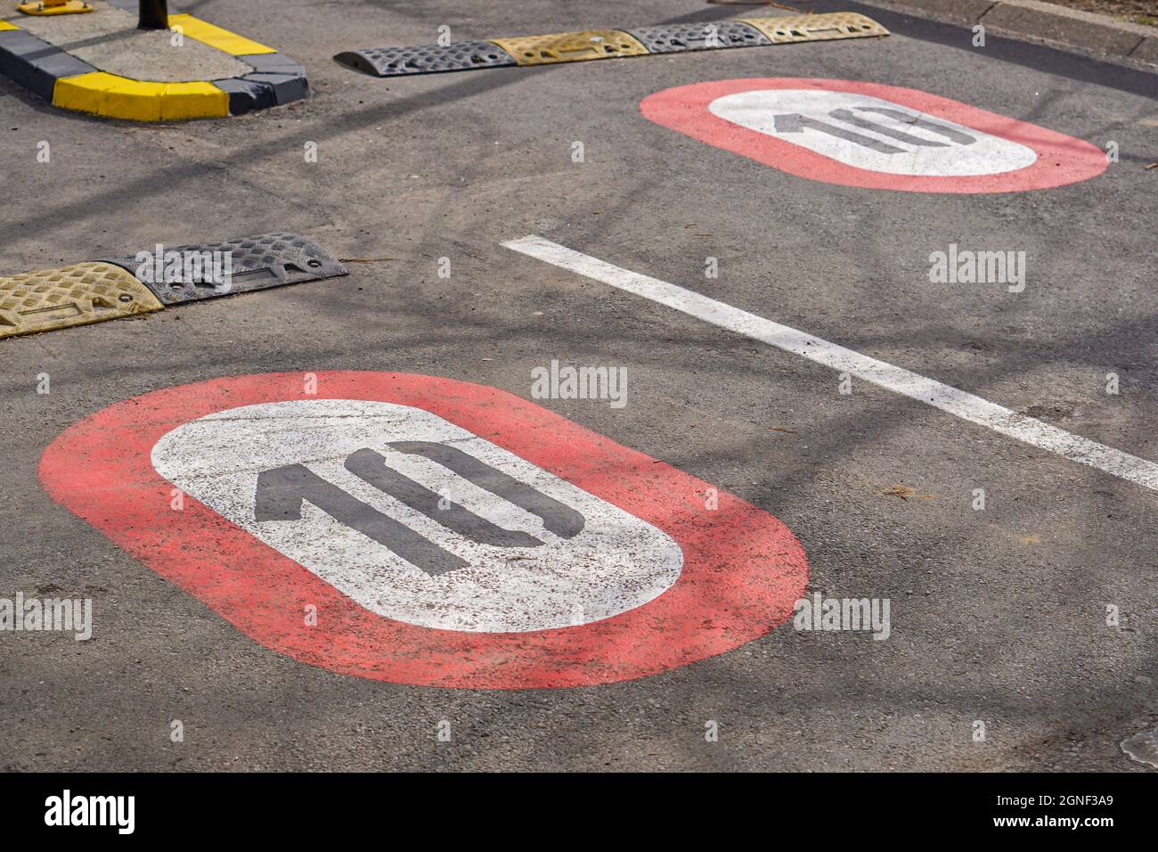 Speed limit ten at parking lot tarmac road sign Stock Photo Alamy