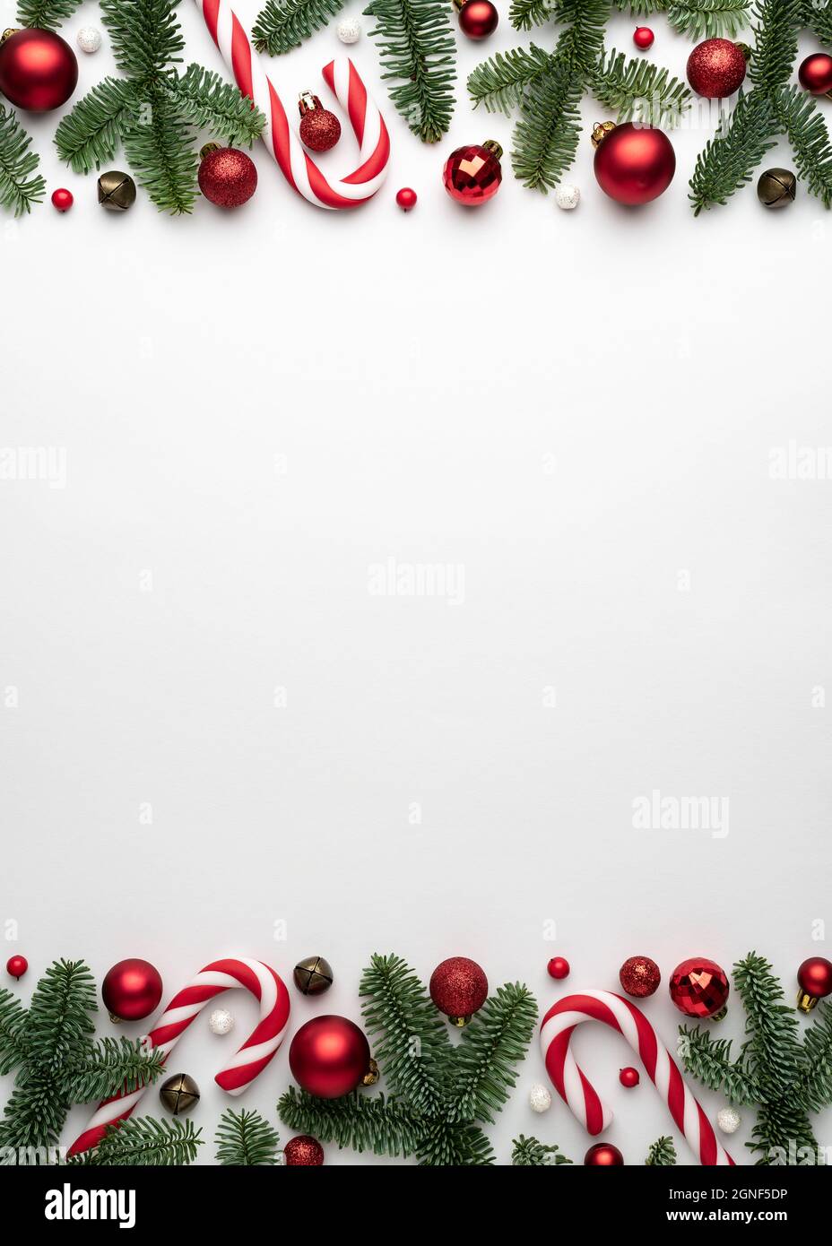 Frame of Christmas tree ornaments on a white background. Festive design with place for text Stock Photo