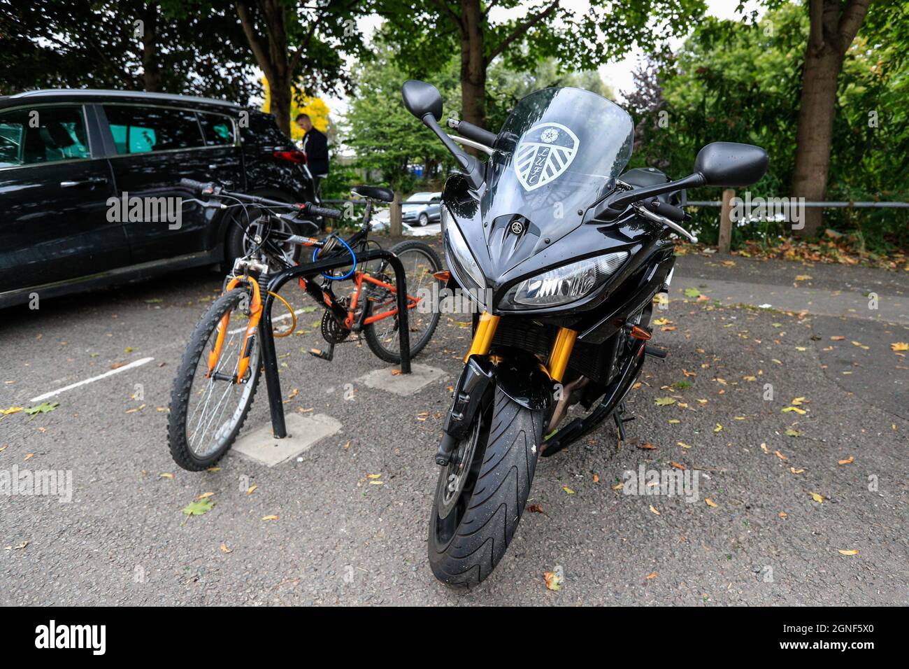 A Motorcycle with a Leeds United badge on the front outside Elland Road