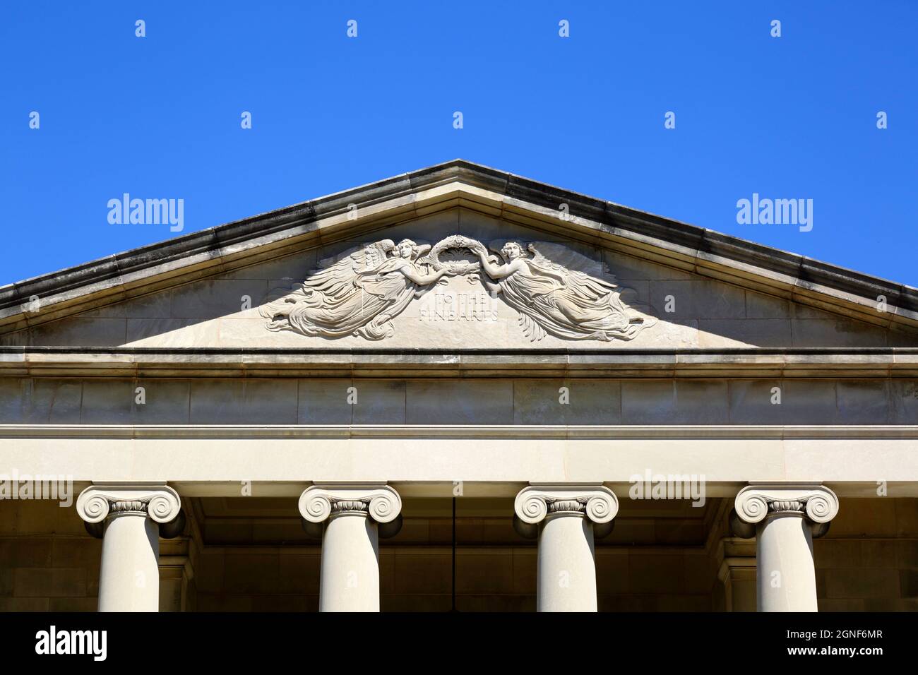 Detail of stone carvings and "To The Fine Arts" inscription on the tympanum above the Baltimore Museum of Art (BMA) entrance, Baltimore, Maryland, USA Stock Photo