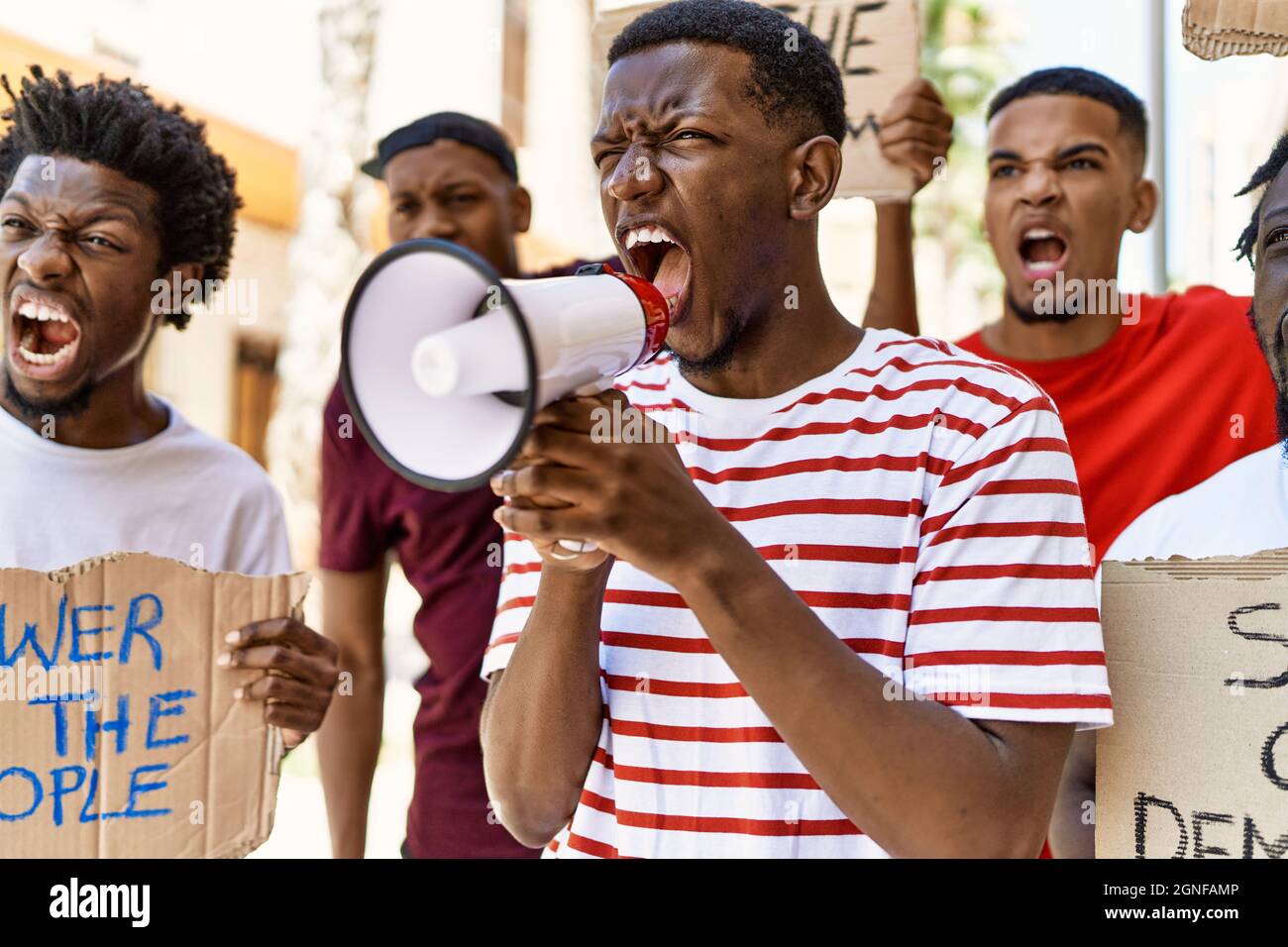 Angry screaming protest activist bullhorn hi-res stock photography and ...