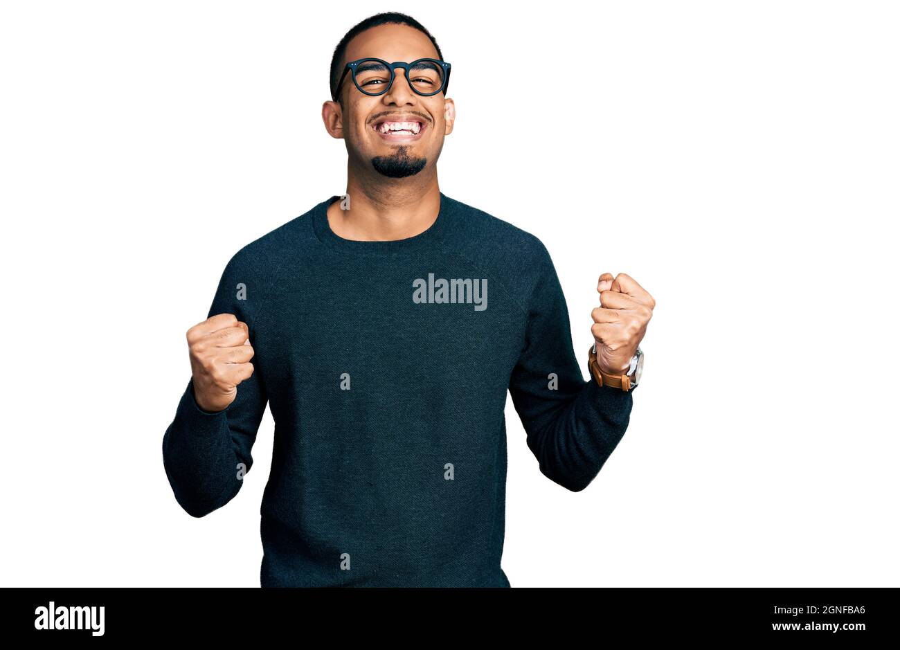Young african american man wearing casual clothes and glasses ...